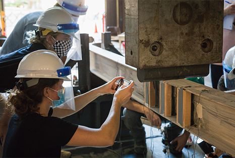 Female students working on a construction project in Fritz Lab